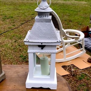 White lantern with candle
